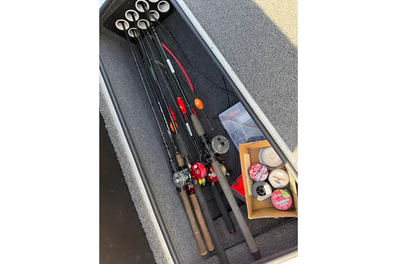 Slide: The Image of Fishing gear storage in 2020 Vexus AVX 2080 boat, featuring rods and tackle. - 29