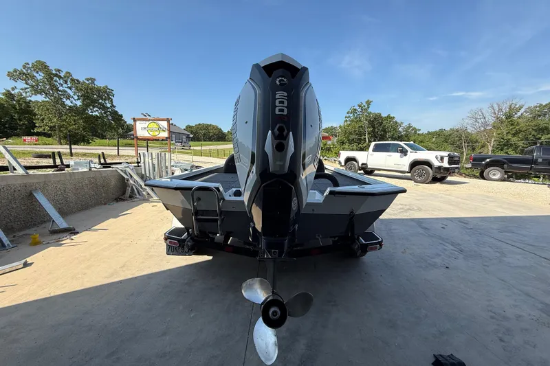 Slide: The Image of 2020 Vexus AVX 2080 boat with powerful outboard motor, parked outdoors. - 3
