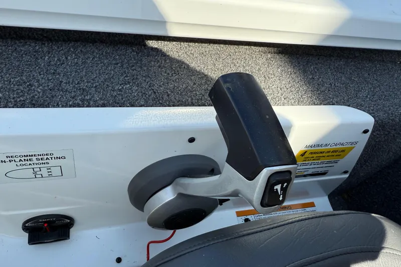 Slide: The Image of Throttle control of 2020 Vexus AVX 2080 boat, featuring seating and capacity labels. - 34