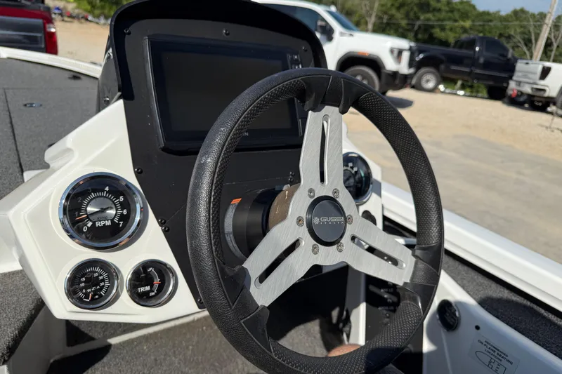 Slide: The Image of 2020 Vexus AVX 2080 boat dashboard with steering wheel and gauges. - 36