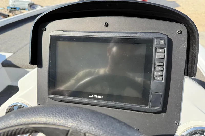 Slide: The Image of Garmin display on 2020 Vexus AVX 2080 boat dashboard, steering wheel visible. - 37
