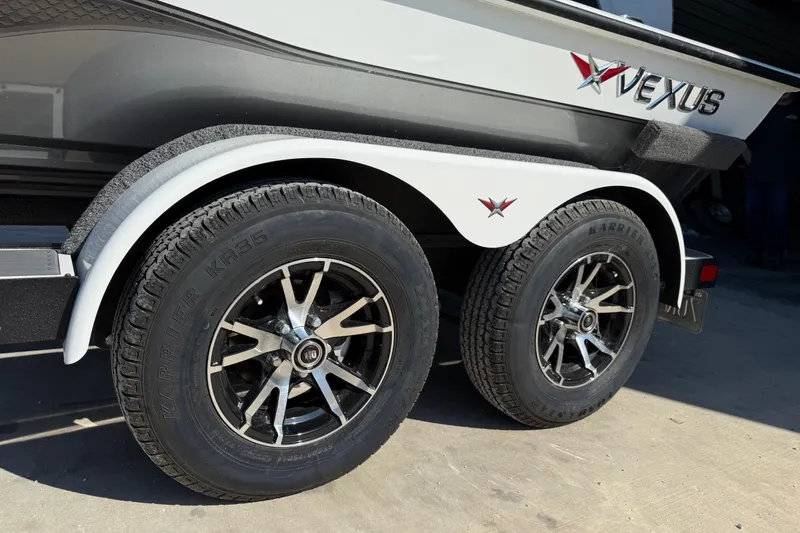 Slide: The Image of 2020 Vexus AVX 2080 boat trailer with dual wheels and sleek design. - 7
