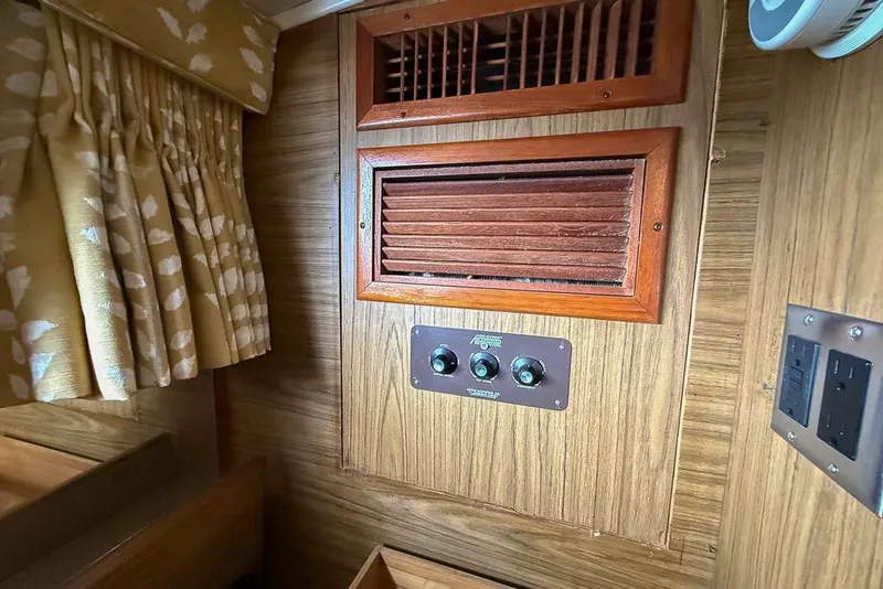 Slide: The Image of Interior of 1969 Chris-Craft 338 Commander with wood paneling and vintage controls. - 12