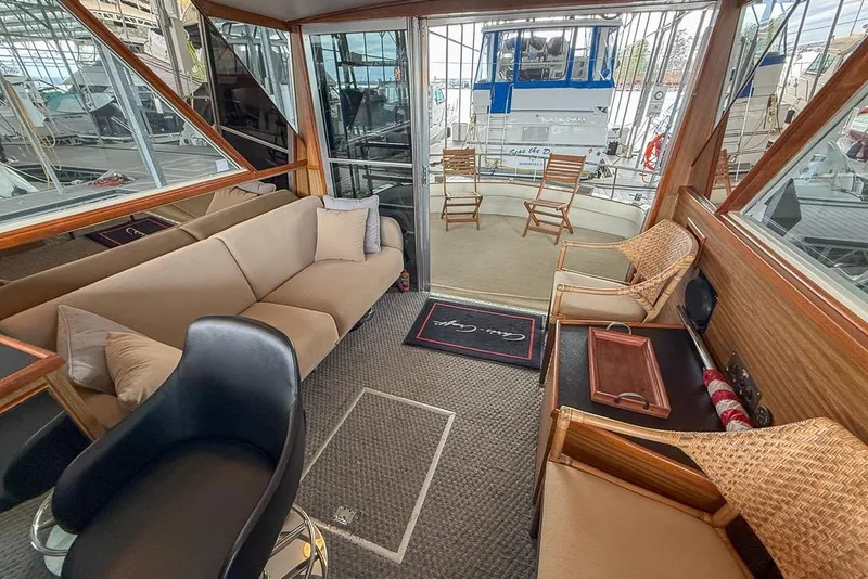 Slide: The Image of Luxurious interior of 1969 Chris-Craft 338 Commander yacht with comfortable seating and elegant decor. - 8