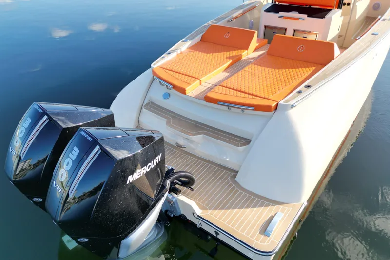 Slide: The Image of 2026 Lilybaeum Lipari 31 boat with dual Mercury 300 V8 engines, orange seating. - 27