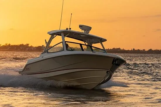 The Image of Manufacturer Provided Image: 2026 Boston Whaler 280 Vantage cruising at sunset on open water. - 0