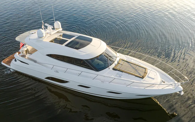 Slide: The Image of 2017 Riviera Sport Cruiser yacht on calm water, aerial view. - 3