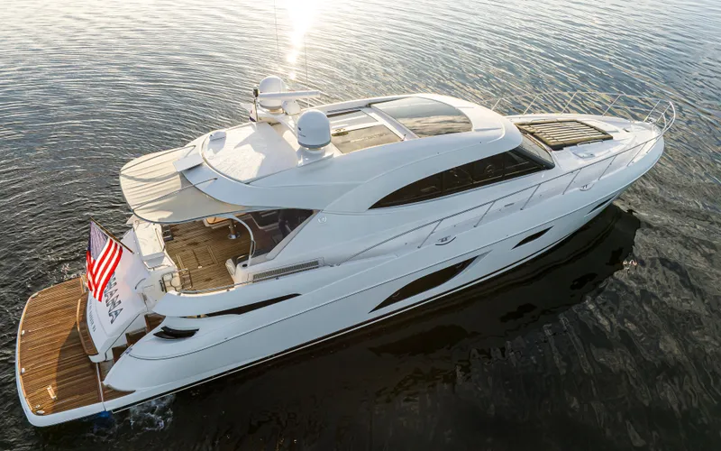 Slide: The Image of 2017 Riviera Sport Cruiser yacht on calm water, aerial view. - 4
