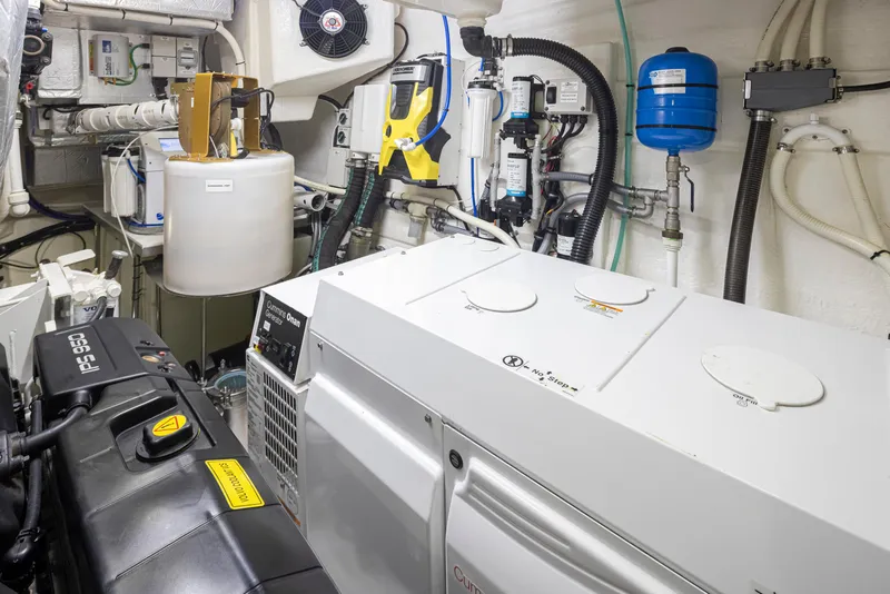 Slide: The Image of Engine room of a 2017 Riviera Sport Cruiser with various mechanical components. - 19