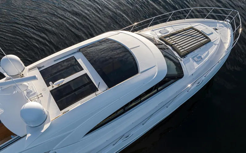 Slide: The Image of 2017 Riviera Sport Cruiser yacht on calm water, aerial view. - 5