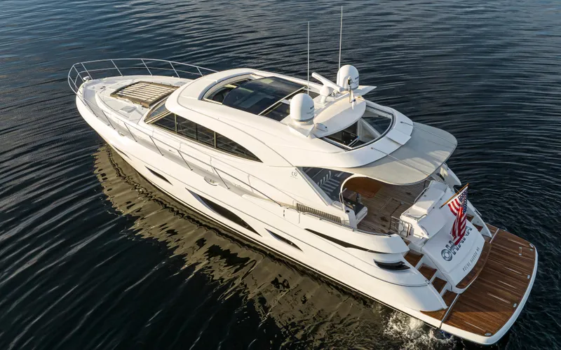 Slide: The Image of 2017 Riviera Sport Cruiser yacht on calm water, aerial view. - 9