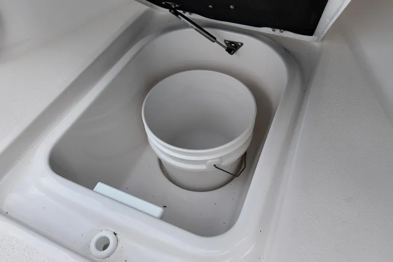 Slide: The Image of Storage compartment with bucket on 2026 Sea Fox 288 Commander boat. - 19