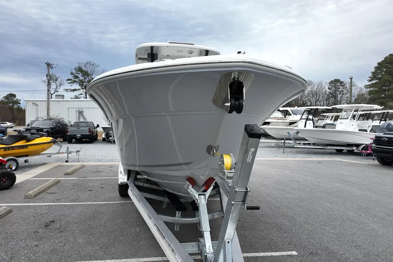 Slide: The Image of 2026 Sea Fox 288 Commander boat on trailer in parking lot. - 2