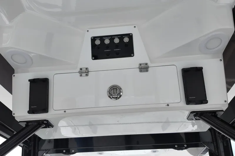 Slide: The Image of 2026 Sea Fox 288 Commander console with control panel and storage compartment. - 22