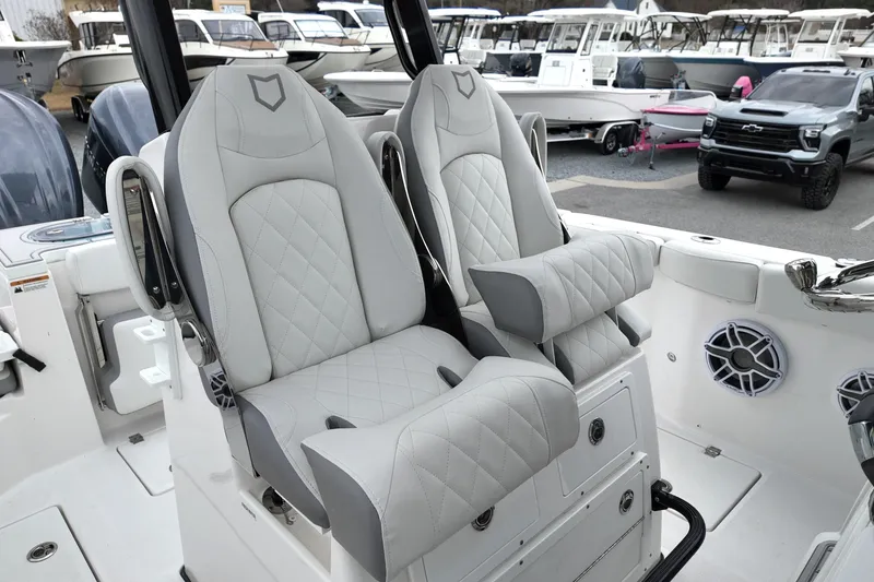 Slide: The Image of Luxury seating on 2026 Sea Fox 288 Commander boat, featuring quilted upholstery and modern design. - 23