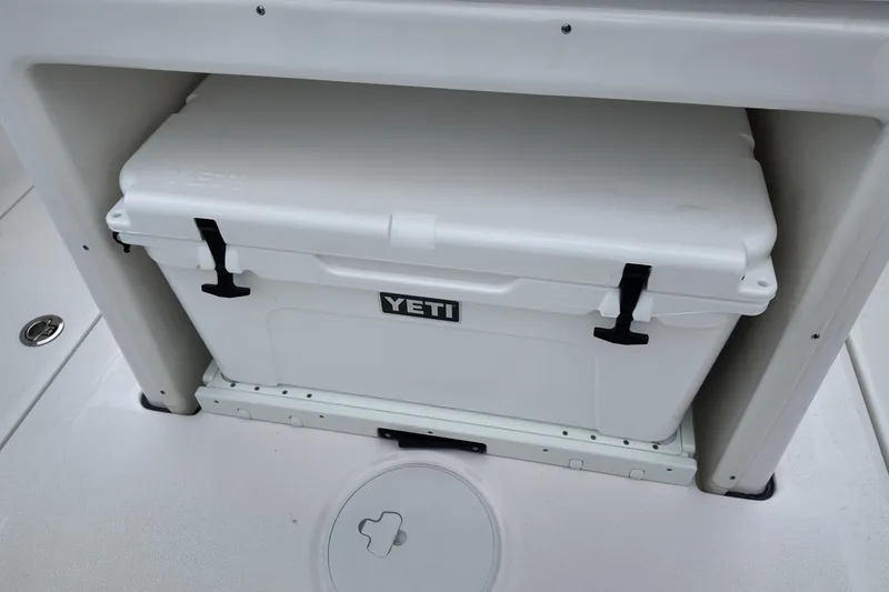 Slide: The Image of White YETI cooler on 2026 Sea Fox 288 Commander boat deck. - 29