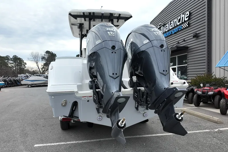 Slide: The Image of 2026 Sea Fox 288 Commander with dual Yamaha 300 engines at dealership. - 34