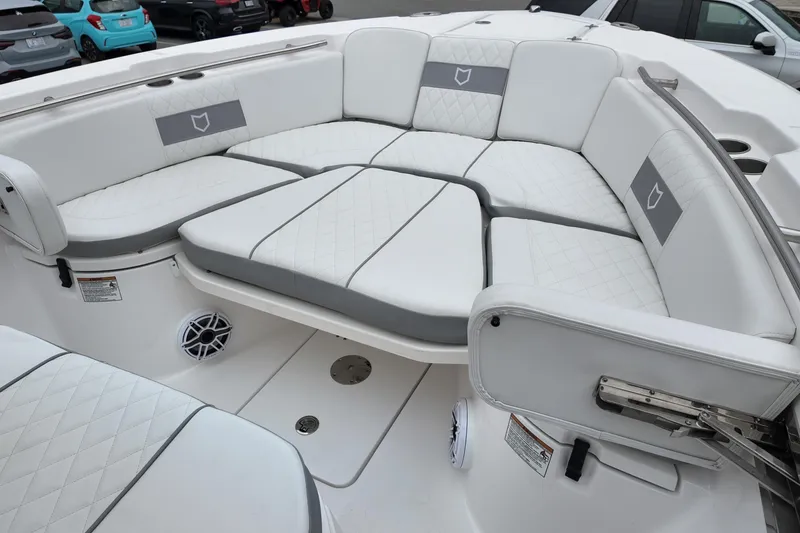 Slide: The Image of Luxurious seating on 2026 Sea Fox 288 Commander boat, featuring white and gray upholstery. - 7