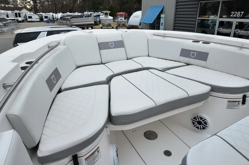 Slide: The Image of 2026 Sea Fox 288 Commander boat with spacious white seating area. - 9