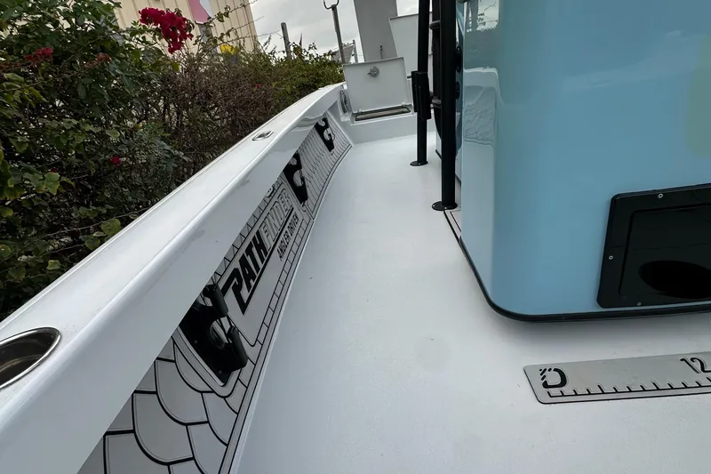 Slide: The Image of 2023 Pathfinder 2500 Hybrid boat deck with measurement ruler and sleek design. - 21