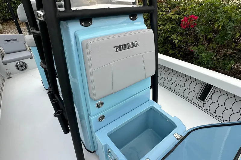 Slide: The Image of 2023 Pathfinder 2500 Hybrid boat interior with storage compartment and seating. - 25