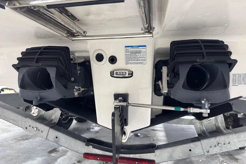Slide: The Image of Rear view of 2025 Yamaha Boats 252SE jet propulsion system on trailer. - 4