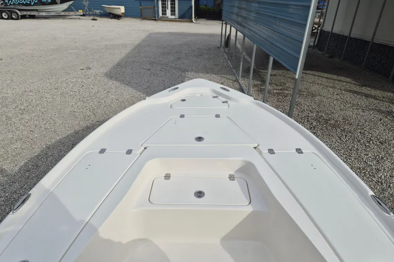 Slide: The Image of 2026 Key West 210 Bay Reef boat deck with storage compartments. - 8