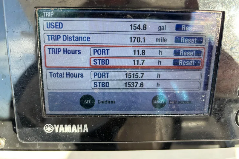 Slide: The Image of Yamaha display showing trip data for 2015 Edgewater 320CC boat. - 30
