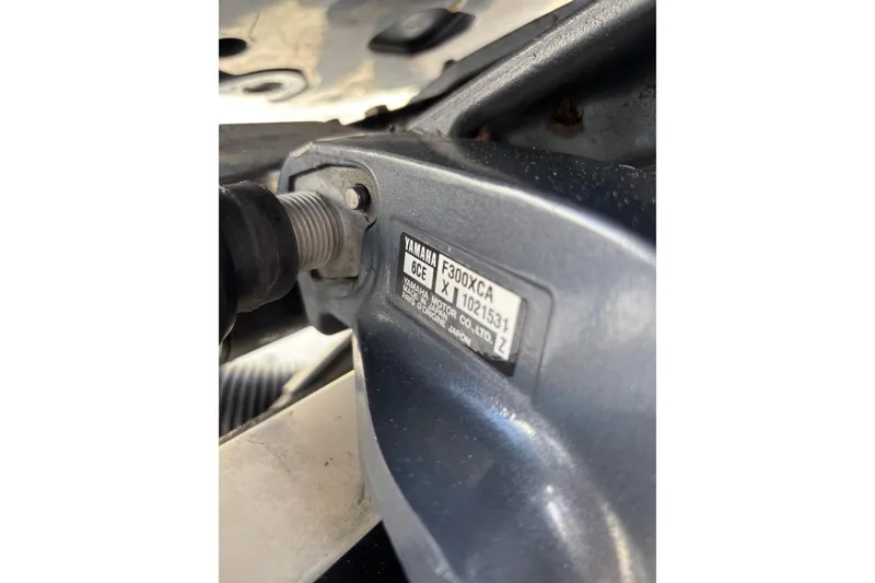 Slide: The Image of Close-up of Yamaha F300XCA engine label on 2015 Edgewater 320CC boat. - 34