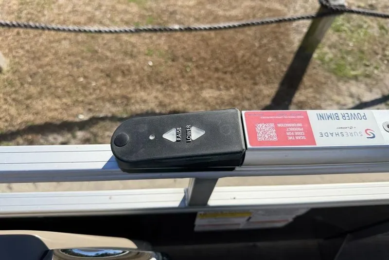 Slide: The Image of Remote control for Sun Tracker Party Barge 20 DLX power bimini, 2023 model. - 19