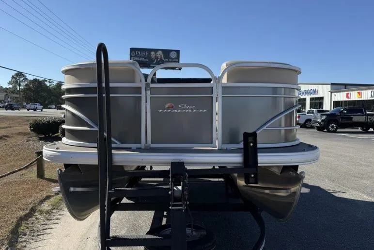 Slide: The Image of 2023 Sun Tracker Party Barge 20 DLX at Marine Service Center, rear view. - 2