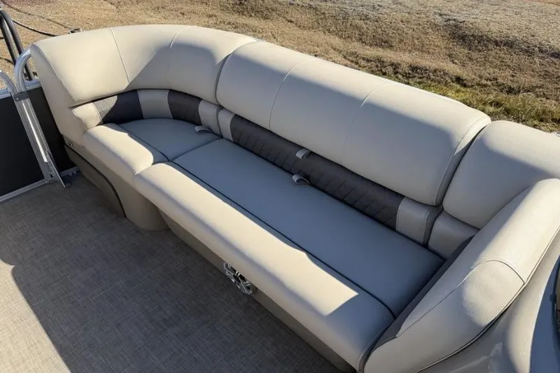 Slide: The Image of 2023 Sun Tracker Party Barge 20 DLX pontoon boat on trailer, side view. - 6