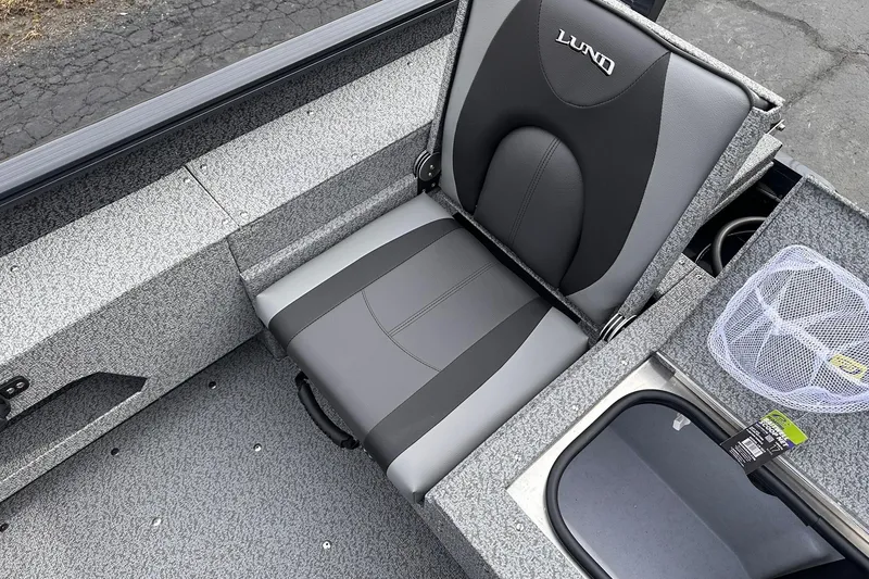 Slide: The Image of 2026 Lund 1775 Adventure Sport boat seat with gray upholstery and storage compartments. - 20