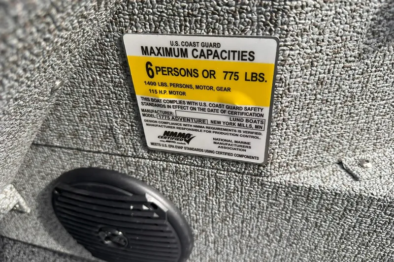 Slide: The Image of 2026 Lund 1775 Adventure Sport capacity label, 6 persons or 775 lbs, U.S. Coast Guard certified. - 28