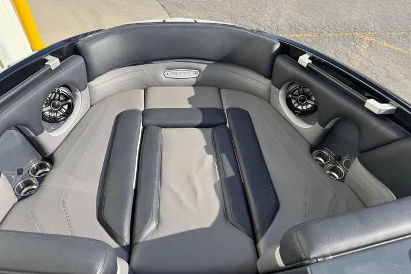 Slide: The Image of 2021 Supra SL 575 boat interior with premium seating and built-in speakers. - 5