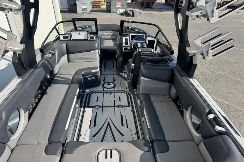 Slide: The Image of Interior of 2021 Supra SL 575 boat with sleek seating and modern design. - 6