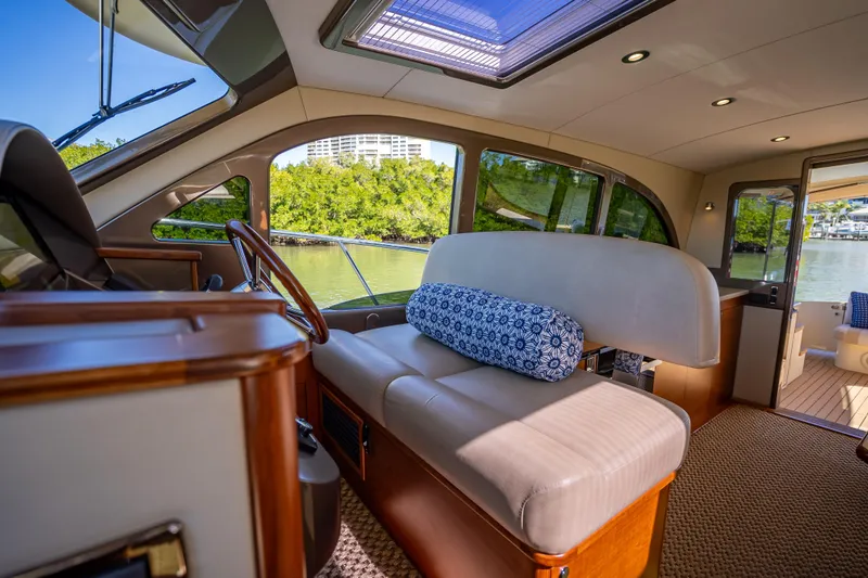 Slide: The Image of Luxurious interior of 2017 Palm Beach Motor Yachts PB45, featuring elegant seating and scenic views. - 30