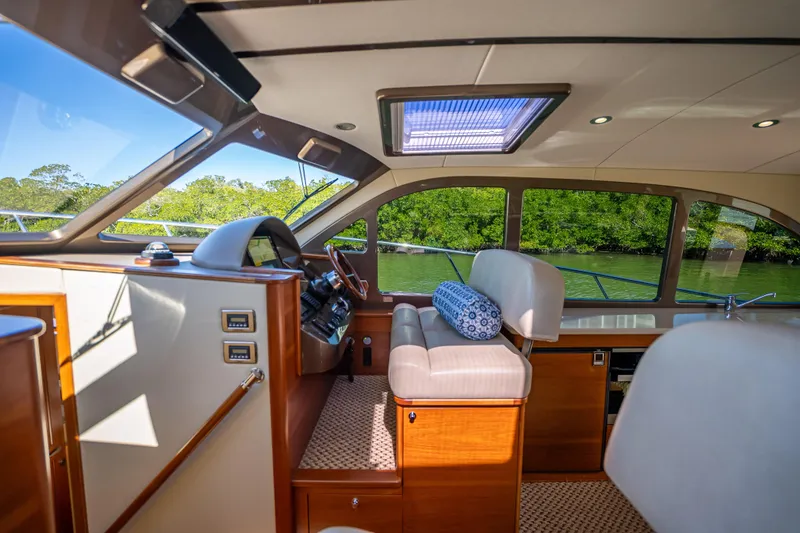 Slide: The Image of Luxurious interior of 2017 Palm Beach Motor Yachts PB45 with plush seating and scenic views. - 4