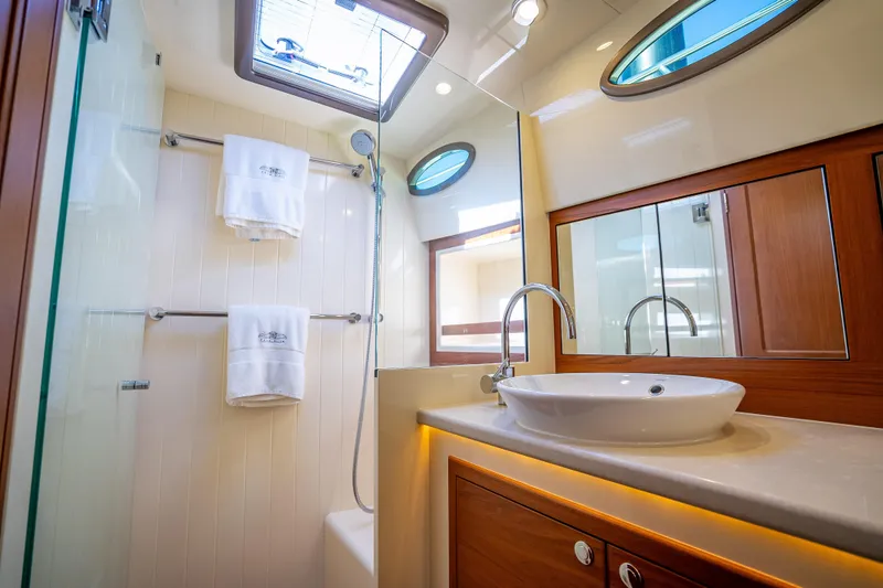 Slide: The Image of Luxurious bathroom in 2017 Palm Beach Motor Yachts PB45, featuring elegant fixtures and modern design. - 44