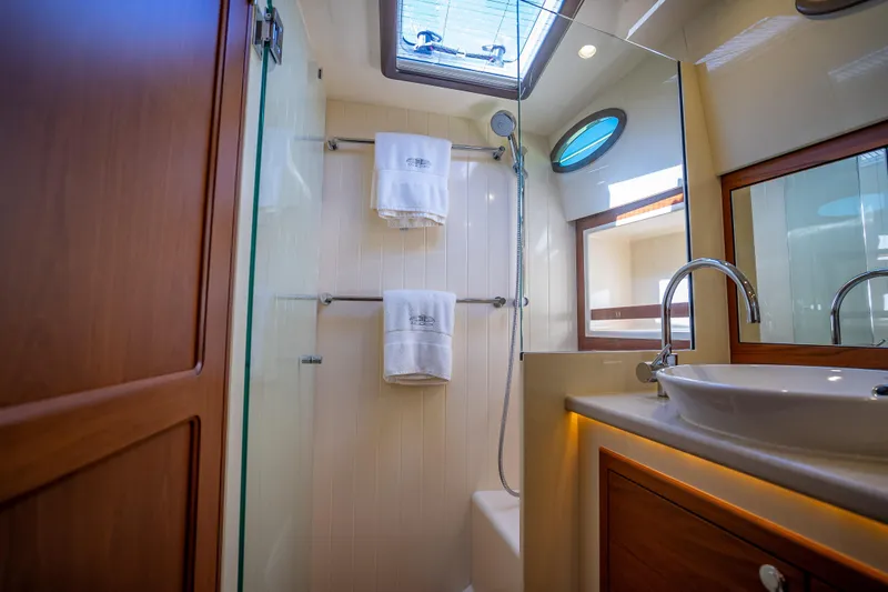 Slide: The Image of Luxurious bathroom in 2017 Palm Beach Motor Yachts PB45, featuring modern fixtures and elegant design. - 46