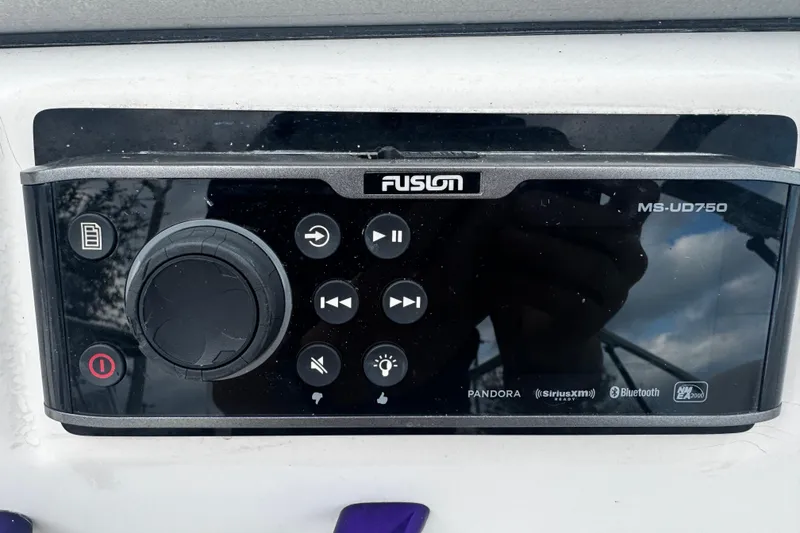 Slide: The Image of Fusion MS-UD750 marine stereo on 2008 Splendor 240 Sunstar boat dashboard. - 9