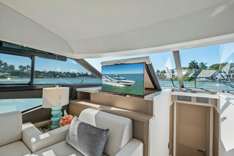 Slide: The Image of Luxurious interior of 2022 Prestige 520 yacht with scenic water views. - 26