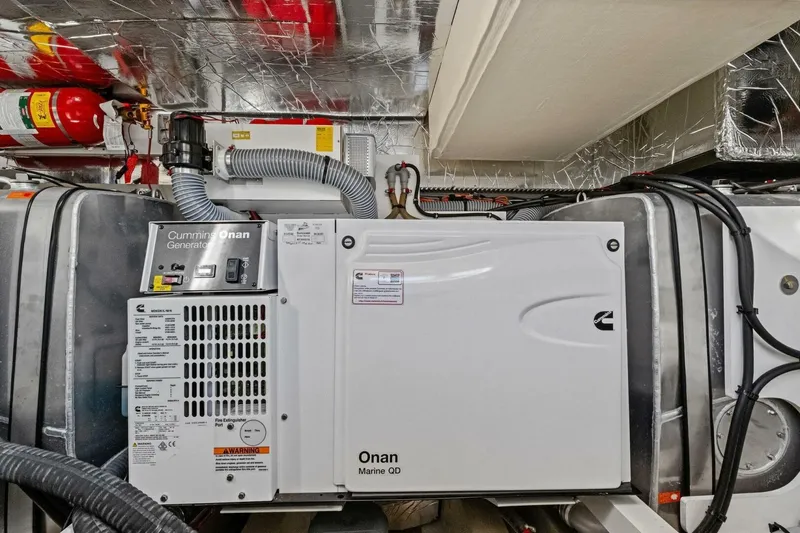 Slide: The Image of Cummins Onan generator in 2022 Prestige 520 yacht engine room. - 80
