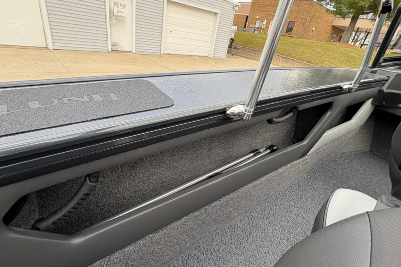 Slide: The Image of 2026 Lund 1875 Crossover XS interior, showcasing sleek design and storage features. - 23