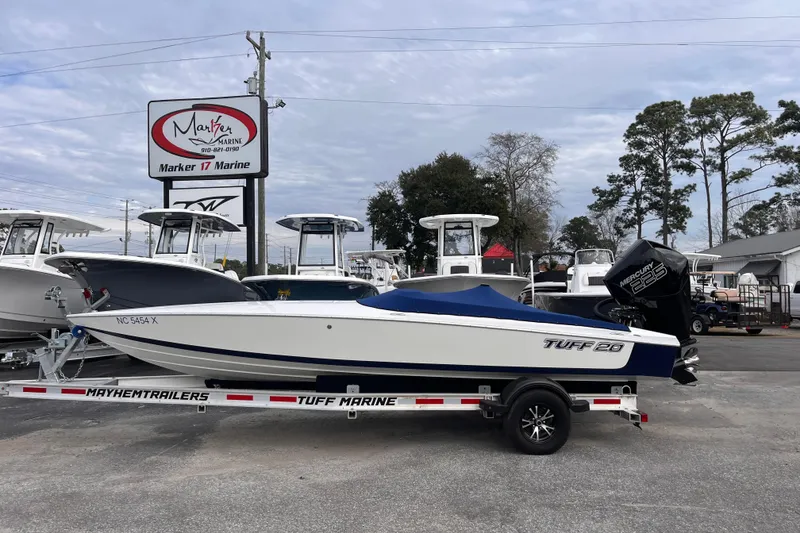 Slide: The Image of 2023 Tuff 20 boat on trailer at Marker 17 Marine dealership. - 2