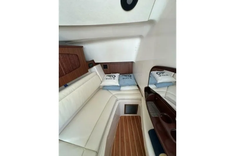 Slide: The Image of Luxurious interior of 2025 Grady-White Freedom 375 boat with plush seating and cushions. - 9