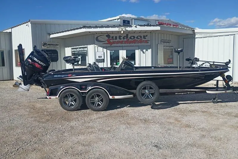 The Image of 2018 Ranger Z521L boat on trailer outside Outdoor Specialties store. - 1
