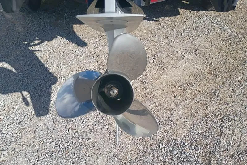 Slide: The Image of 2018 Ranger Z521L boat propeller on gravel surface. - 8