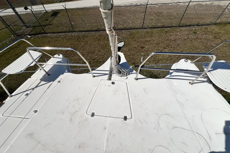 Slide: The Image of Deck view of 2013 Gemini Legacy 35 catamaran with railing and rope details. - 100