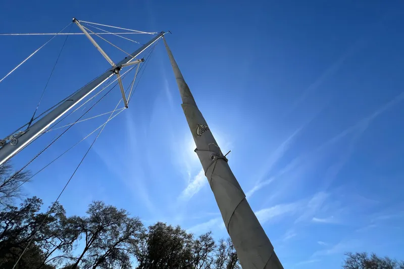 Slide: The Image of Sailboat mast of 2013 Gemini Legacy 35 against clear blue sky. - 106